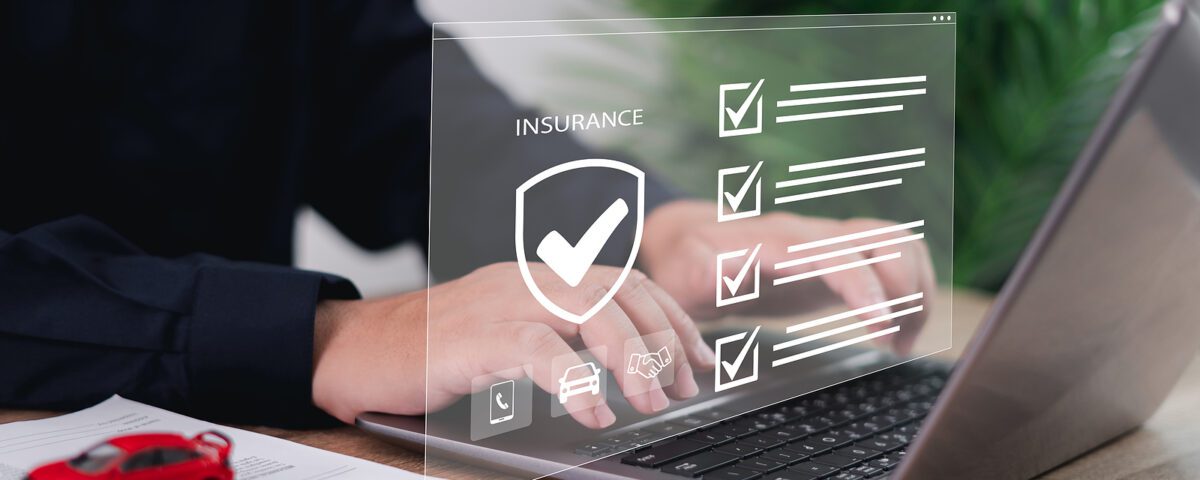 Car Dealer Businessman Use Laptop,checklist And Signing Car Insu